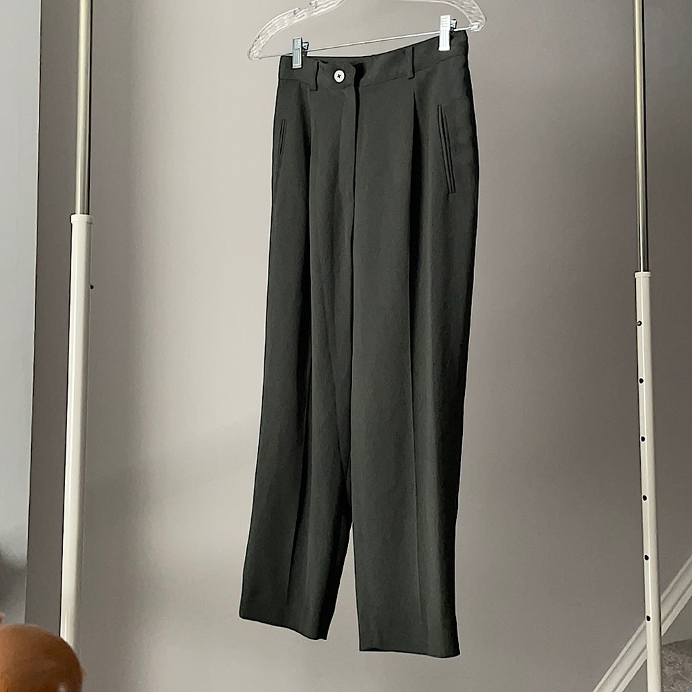 Olive green pleated high waisted pegged trousers